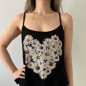 Tres bien - size L - black top with daisies - perfect condition.